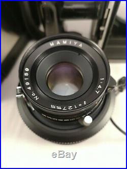 Polaroid 600 SE with Mamiya 127mm 14,7 lens and quartz date back