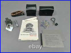 Polaroid Land Camera Model 180 with Tominon 114mm f4.5 Lens and Accessories