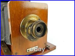 The Clydesdale Set Patent 1/4 Plate Wood & Brass Camera With Dial Brass Lens