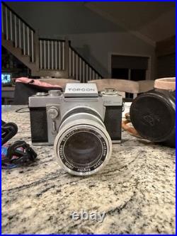 Topcon RE Super SLR Camera Silver Black with Lens, Case, and Strap Vintage