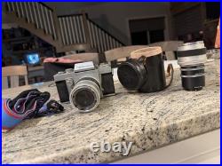 Topcon RE Super SLR Camera Silver Black with Lens, Case, and Strap Vintage