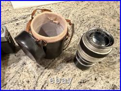 Topcon RE Super SLR Camera Silver Black with Lens, Case, and Strap Vintage