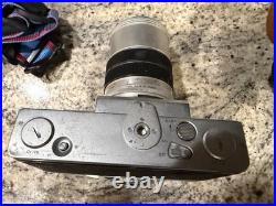 Topcon RE Super SLR Camera Silver Black with Lens, Case, and Strap Vintage