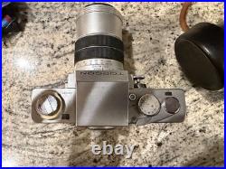 Topcon RE Super SLR Camera Silver Black with Lens, Case, and Strap Vintage