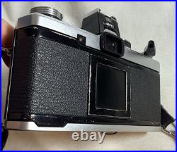 Used VTG Olympus OM-2n MD 35mm Film SLR Camera with 50mm Lens, Cap, Strap