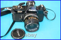 VINTAGE CANON EF 35mm CAMARA WITH A CANON LENS FD 28mm, SERIAL NUMBER 349450