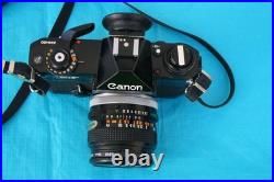 VINTAGE CANON EF 35mm CAMARA WITH A CANON LENS FD 28mm, SERIAL NUMBER 349450
