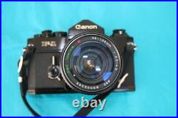 VINTAGE CANON F1 35mm CAMARA WITH A RMC TOKINA 35-105 LENS, SN 531507