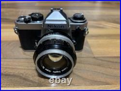 VINTAGE Nikon FE 35mm Film Camera with Multiple Lenses and Accessories