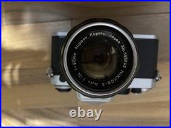 VINTAGE Nikon FE 35mm Film Camera with Multiple Lenses and Accessories