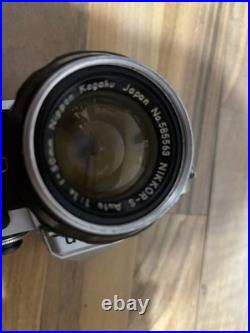 VINTAGE Nikon FE 35mm Film Camera with Multiple Lenses and Accessories VINTAGE Nikon FE 35mm Film Camera with Multiple Lenses and Accessories