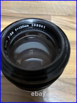 VINTAGE Nikon FE 35mm Film Camera with Multiple Lenses and Accessories