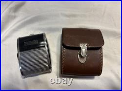 VINTAGE Nikon FE 35mm Film Camera with Multiple Lenses and Accessories VINTAGE Nikon FE 35mm Film Camera with Multiple Lenses and Accessories