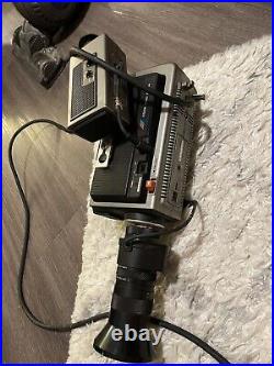 Vintage 80s video camera recorder with lens