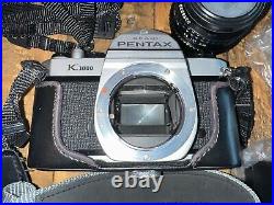 Vintage Asahi Pentax K1000 camera. With Lens Cap, Battery, Flash Bundle Lot