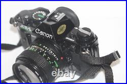 Vintage Black Body Canon AE-1 Program 35mm Film Camera with 50mm 11.4 Lens Tested