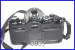 Vintage Black Body Canon AE-1 Program 35mm Film Camera with 50mm 11.4 Lens Tested