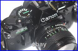 Vintage Black Body Canon AE-1 Program 35mm Film Camera with 50mm 11.4 Lens Tested