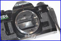 Vintage Black Body Canon AE-1 Program 35mm Film Camera with 50mm 11.4 Lens Tested