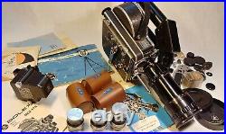 Vintage Bolex H16 16mm Reflex camera with 4 lenses, accessories & manuals