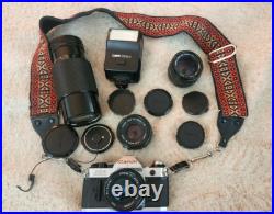 Vintage CANON AE-1 35MM Camera w 3 Lenses Flash + Strap + Covers Uses Film