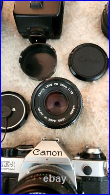 Vintage CANON AE-1 35MM Camera w 3 Lenses Flash + Strap + Covers Uses Film