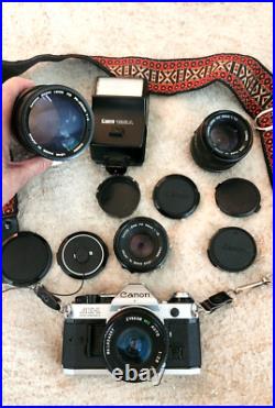 Vintage CANON AE-1 35MM Camera w 3 Lenses Flash + Strap + Covers Uses Film
