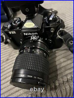 Vintage Camera lot- Nikon FE2 w tokina at-x 285 lense & sunpac autozoom Nikon
