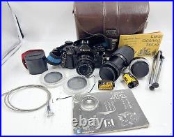 Vintage Canon A-1 35mm SLR Film Camera Black Manual Focus with Lens & Accessories