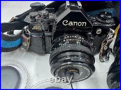 Vintage Canon A-1 35mm SLR Film Camera Black Manual Focus with Lens & Accessories