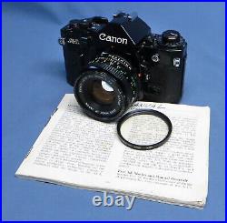 Vintage Canon A-1 Black Body 35mm SLR Film Camera with50mm f1.8 Lens & Filter VGC