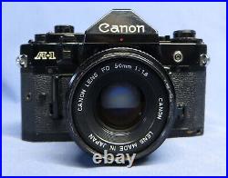 Vintage Canon A-1 Black Body 35mm SLR Film Camera with50mm f1.8 Lens & Filter VGC