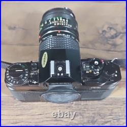 Vintage Canon A-1 Camera with Tokina Doubler & 50mm Lens Tested & Works