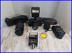 Vintage Canon A-1 Film Camera 35mm with3 Lenses Flash And Extras