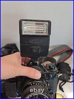 Vintage Canon A-1 Film Camera 35mm with3 Lenses Flash And Extras