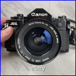 Vintage Canon A-1 Film Camera with Canon FL 35mm f2.5 Wide Angle Lens & Manual