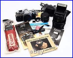 Vintage Canon AE-1 35MM Camera with 50mm 11.8 Lens, Speedlite 199A, & Accessories