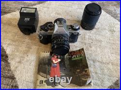 Vintage Canon AE-1 35mm Film Camera + FD 50mm f/1.8 Lens -excellent Vintage Canon AE-1 35mm Film Camera + FD 50mm f/1.8 Lens -excellent