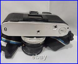 Vintage Canon AE-1 35mm Film SLR Camera with FD 50mm 11.8 Lens And Flash