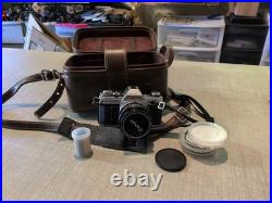 Vintage Canon AE-1 35mm Manual SLR Film Camera Bundle With 50mm Lens Strap & Case