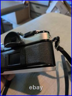 Vintage Canon AE-1 35mm Manual SLR Film Camera Bundle With 50mm Lens Strap & Case Vintage Canon AE-1 35mm Manual SLR Film Camera Bundle With 50mm Lens Strap & Case