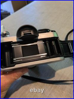 Vintage Canon AE-1 35mm Manual SLR Film Camera Bundle With 50mm Lens Strap & Case Vintage Canon AE-1 35mm Manual SLR Film Camera Bundle With 50mm Lens Strap & Case