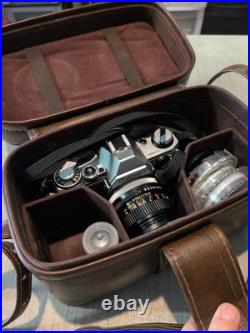 Vintage Canon AE-1 35mm Manual SLR Film Camera Bundle With 50mm Lens Strap & Case Vintage Canon AE-1 35mm Manual SLR Film Camera Bundle With 50mm Lens Strap & Case