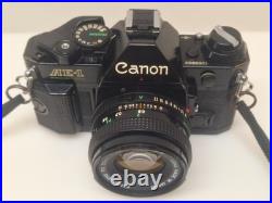 Vintage Canon AE-1 35mm SLR Camera Bundle 50mm Lenses 188A Flash Extension Tube