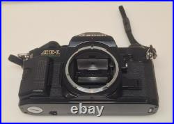 Vintage Canon AE-1 35mm SLR Camera Bundle 50mm Lenses 188A Flash Extension Tube
