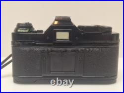Vintage Canon AE-1 35mm SLR Camera Bundle 50mm Lenses 188A Flash Extension Tube