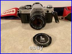 Vintage Canon AE-1 35mm SLR Camera, Telephoto Lens, Flash, Camera Grip, Cases