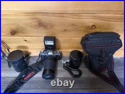 Vintage Canon AE-1 35mm SLR Film Camera with 35-200mm and 100mm FD Lens