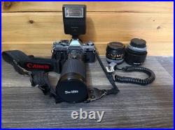 Vintage Canon AE-1 35mm SLR Film Camera with 35-200mm and 100mm FD Lens