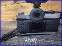 Vintage Canon AE-1 35mm SLR Film Camera with 35-200mm and 100mm FD Lens